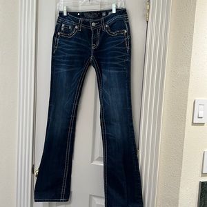Miss Me size 27 Boot cut mid rise. Only worn a couple of times.